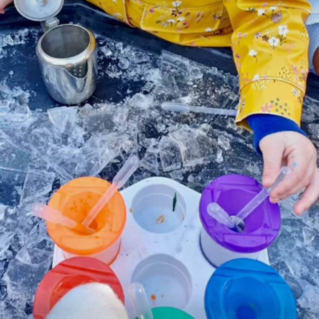 experimenting with ice - outdoor play with pipettes