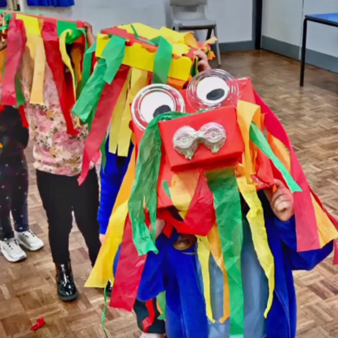 cardboard dragon created by nursery children